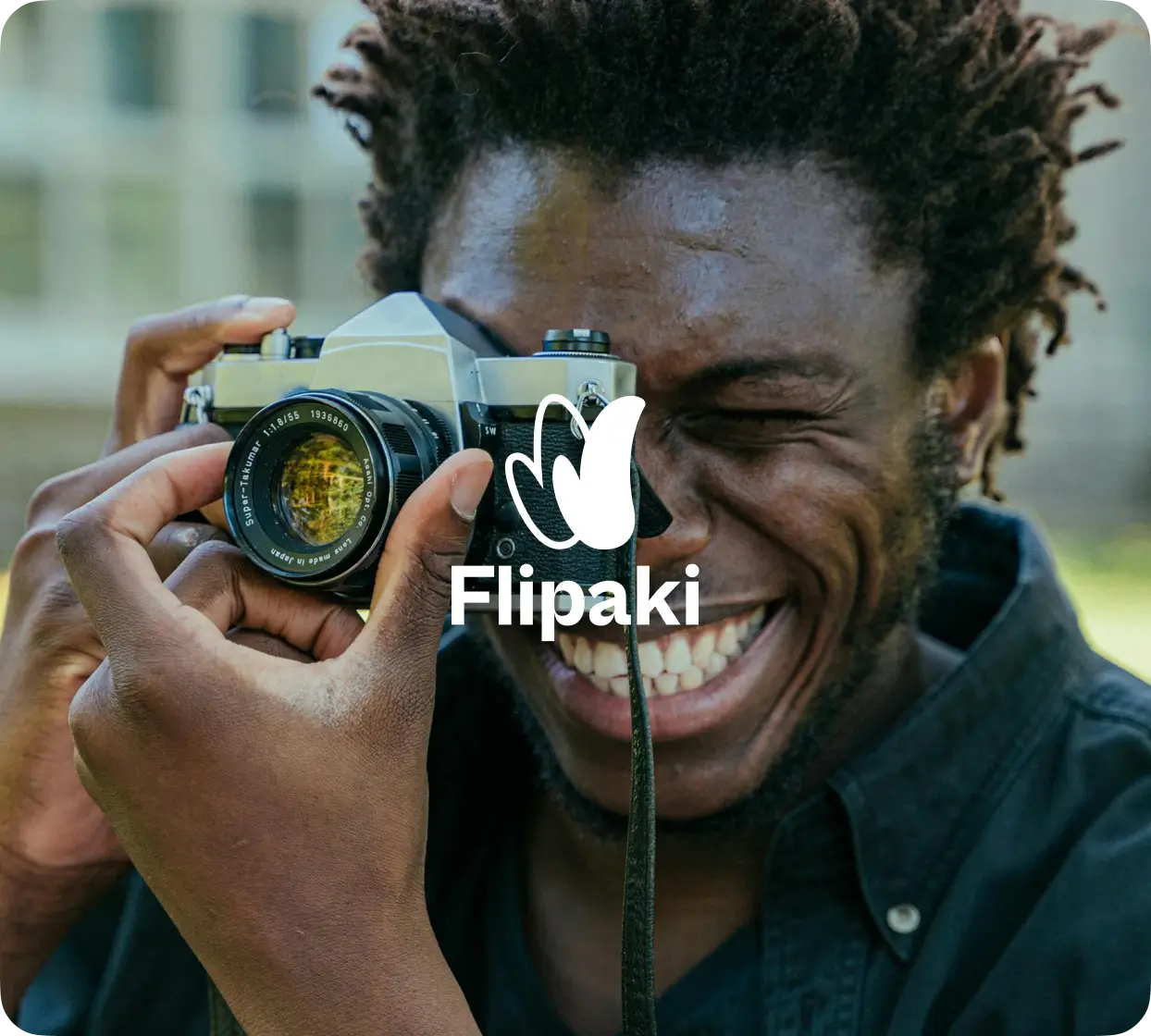 Un fotógrafo sonriente — comunidad Flipaki